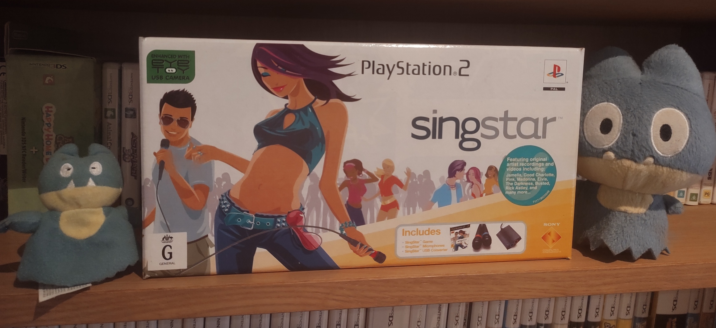 A photo of my retail box for SingStar on the PS2.